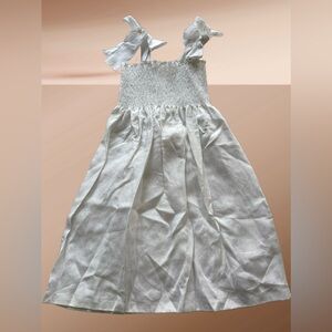 Elegant White Smocked Dress with Bow Straps